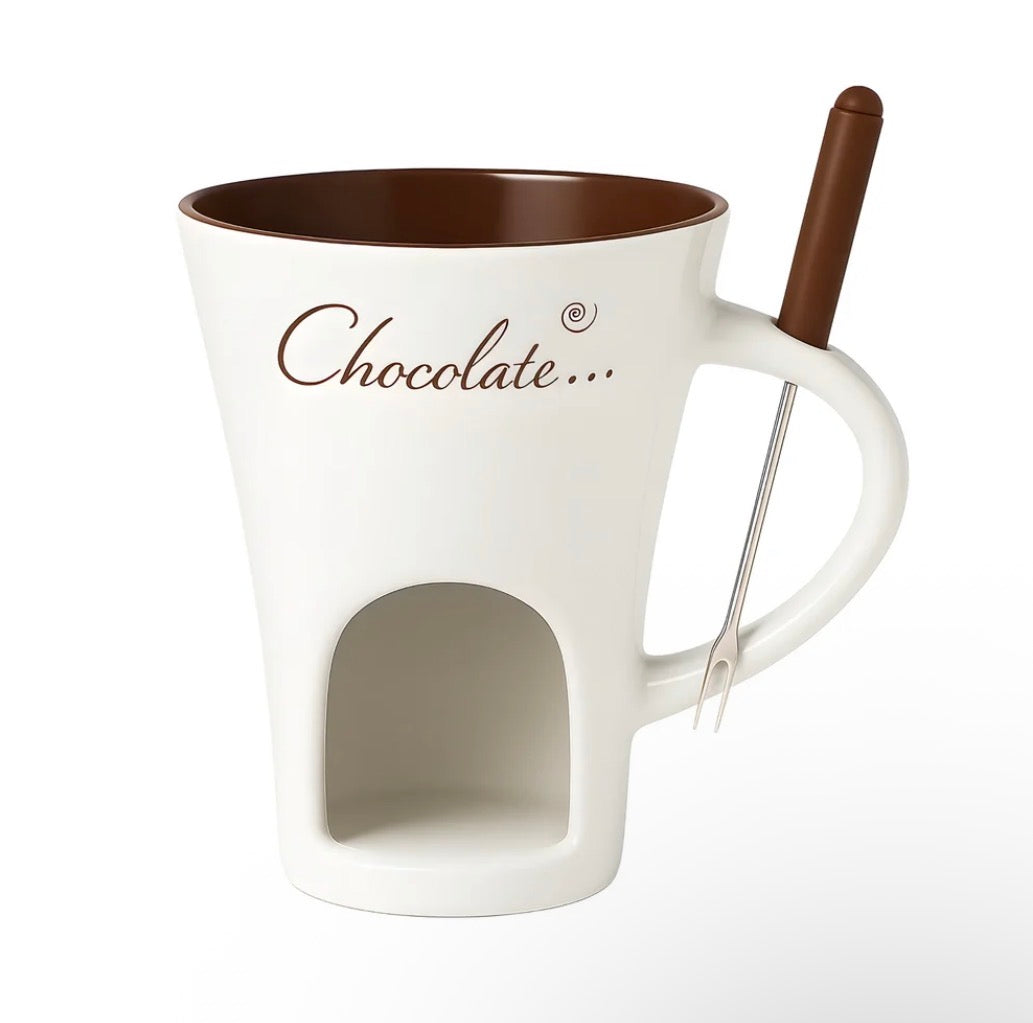 White ceramic chocolate warmer mug with built-in candle chamber and dipping fork